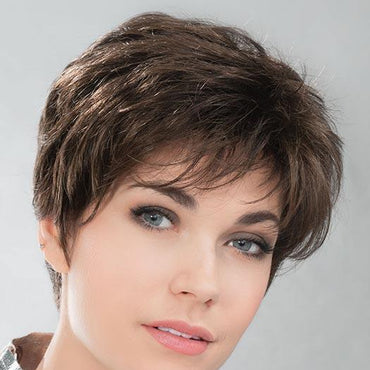 Designed to offer fullness on the top crown area and slightly longer bangs that frame the face nicely
